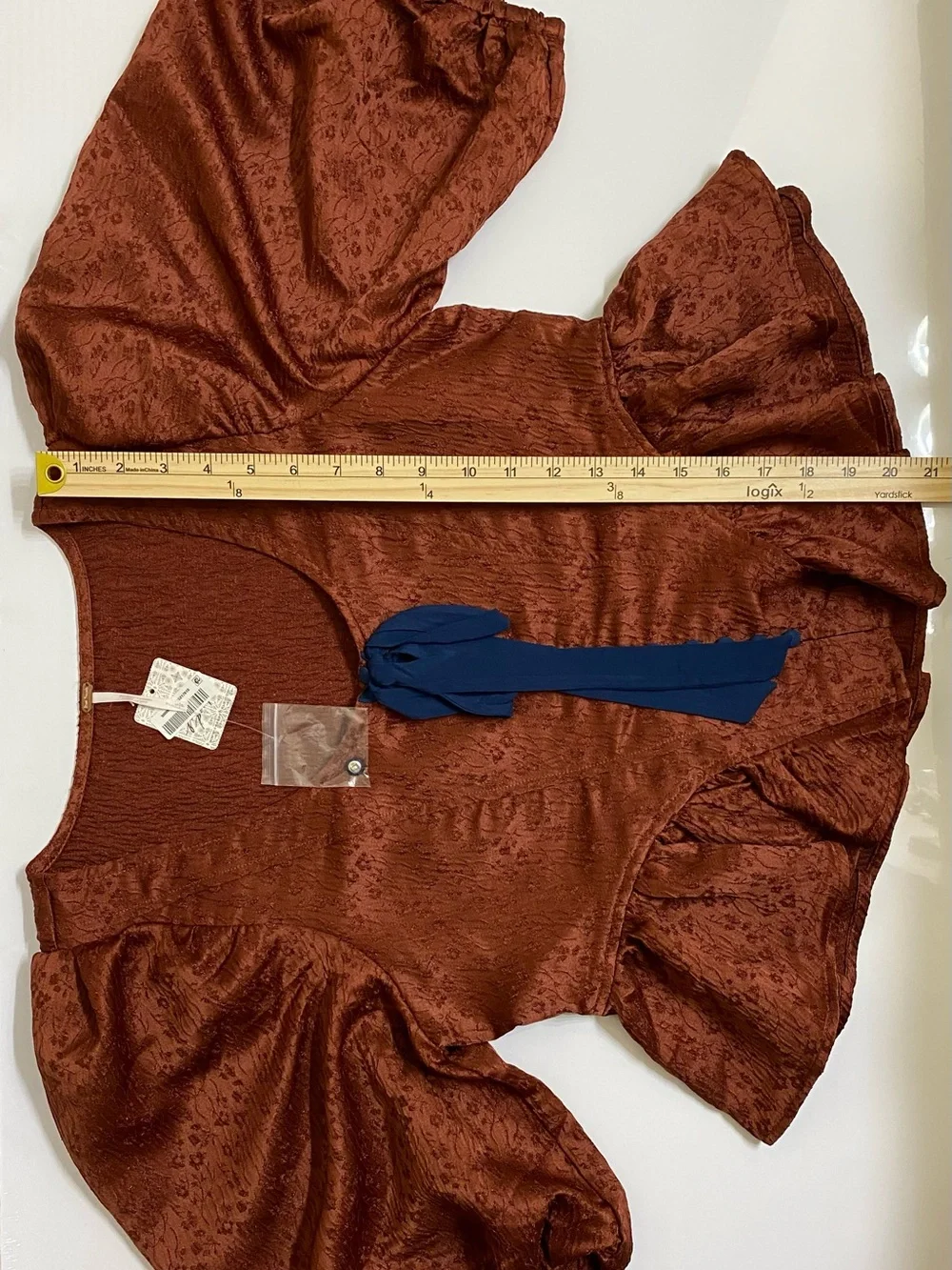 Free People $168 Women’s Pamela Bow Top in Spiced Rum